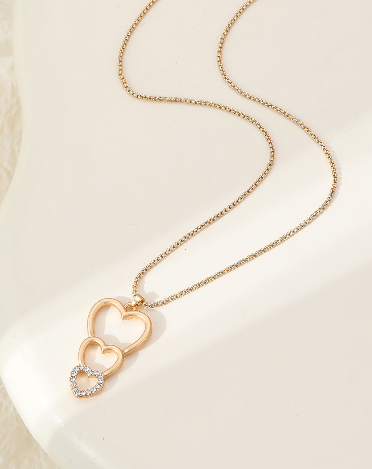 Gold Plated Triple Heart Pendant Necklace with Crystal Accents