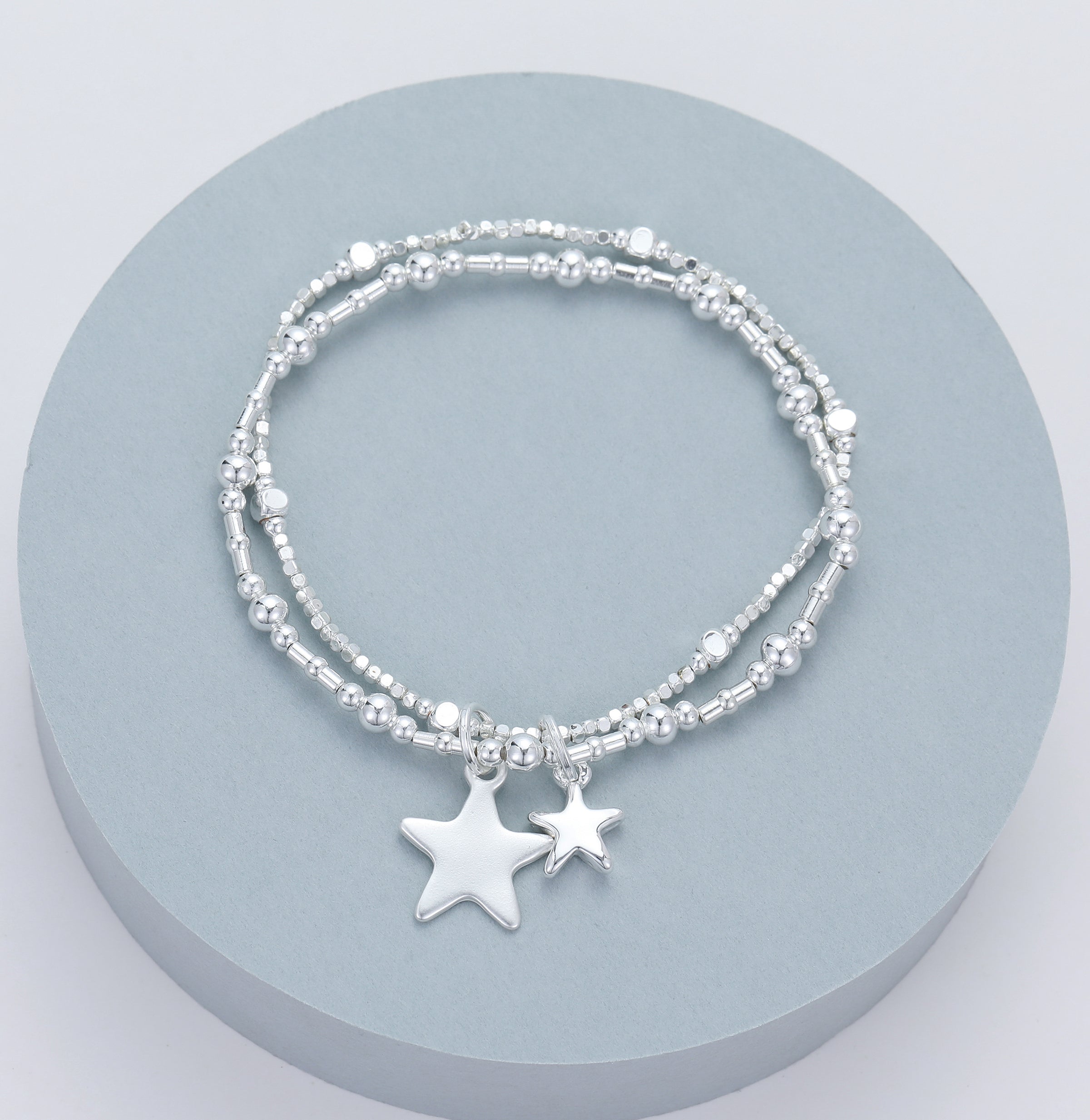 Silver Plated Double Strand Beaded Bracelet with Dual Star Charms