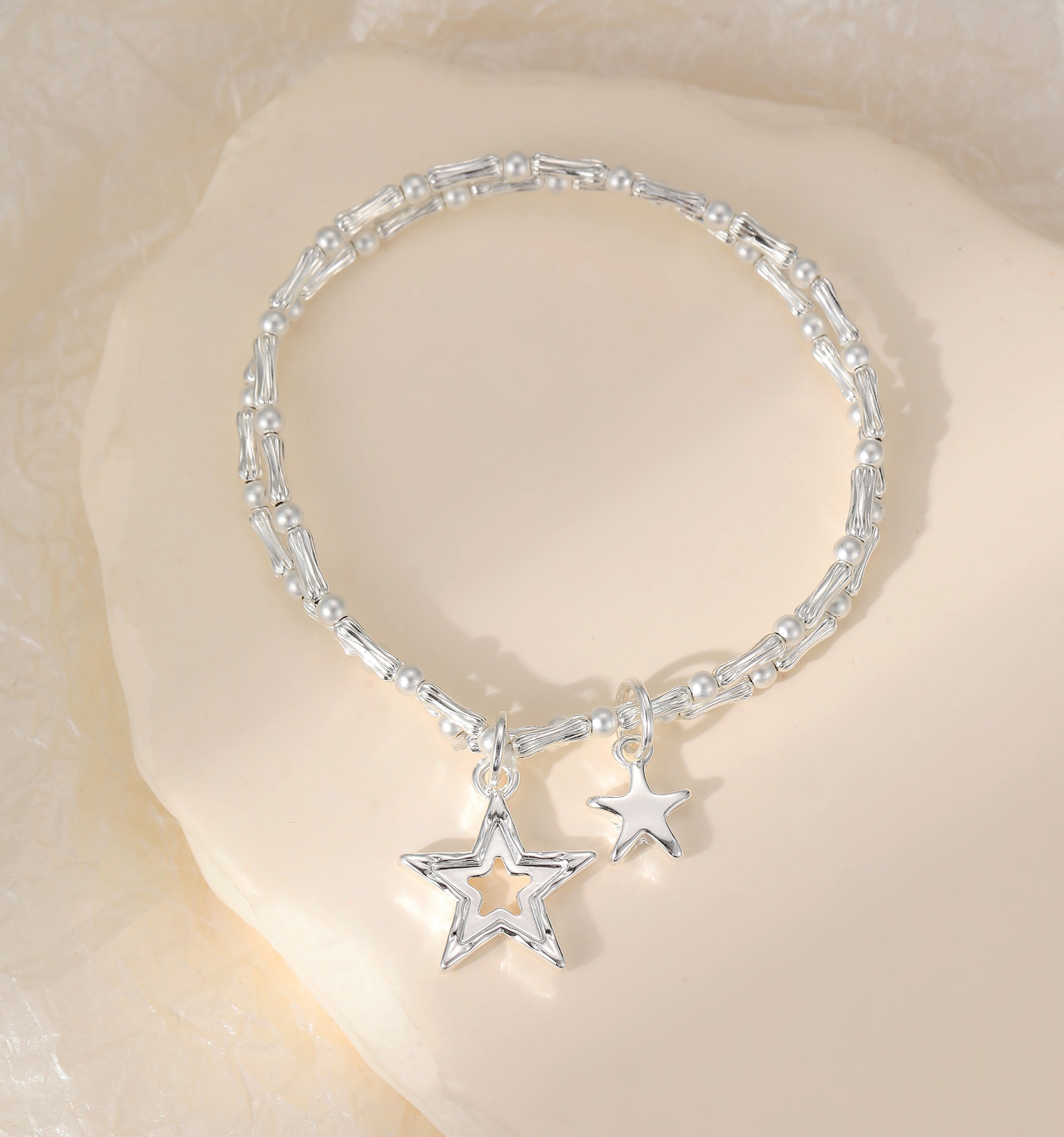 Silver Plated Tubular Beaded Stretch Bracelet with Twin Star Charms
