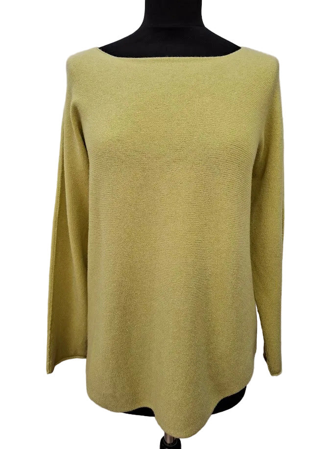 Lime green sweater on a mannequin against a plain background