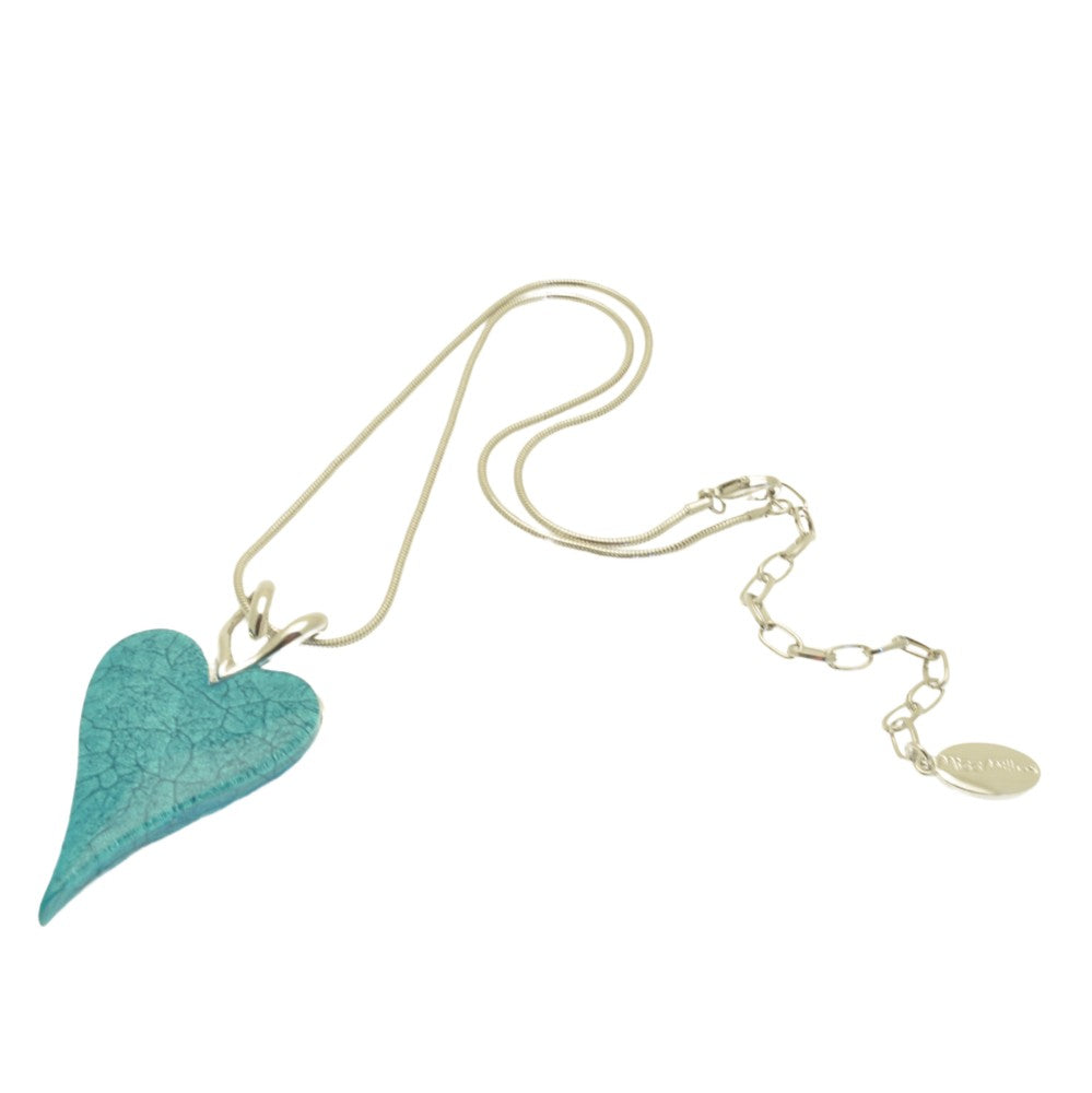 Necklace with a turquoise heart-shaped pendant on a white background