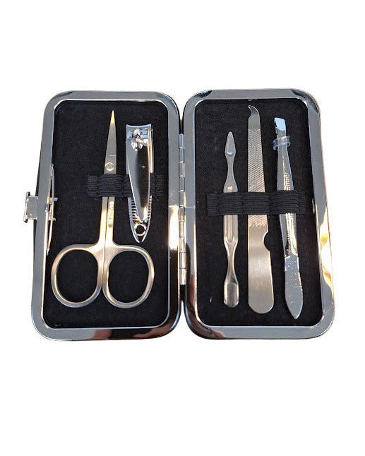 Manicure set with scissors, clippers, and tweezers in a black case on a white background.